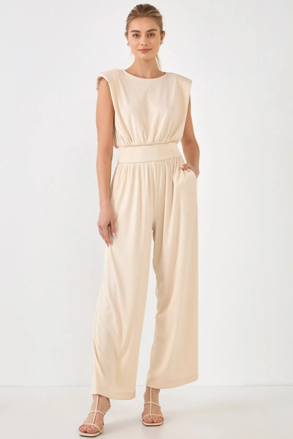 endless_rose__shoulder_pa_1.webp ENDLESS ROSE Tops | One Pieces*- Shoulder Pad Jumpsuit with Smocked Waist CREAM